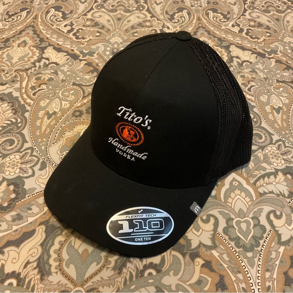 NWT Travis Matthew Tito’s Vodka Widder 2.0 110 Flexfit Trucker Hat